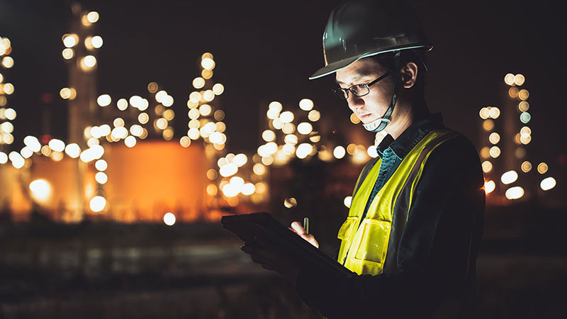 Asian man at factory, stock photo.