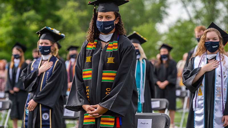 Picture from Franklin College's 2021 commencement shows students standing at attention.