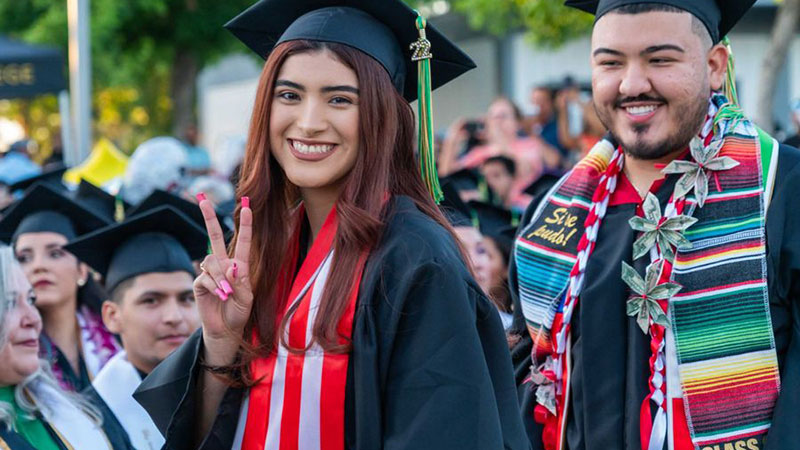 Karime Lopez celebrates after receiving her degree from Madera Community College at the school’s 2022 commencement. Photo: Madera Community College.